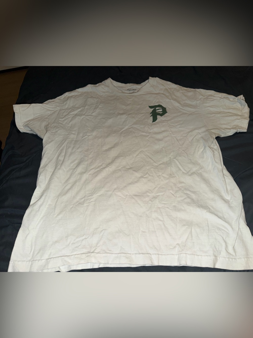 Primitive White Short Sleeve Tee with Green Chest Logo